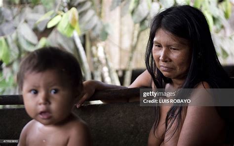 A Woman Of The Wounaan Nonam Indigenous Ethnic Group Looks At Her