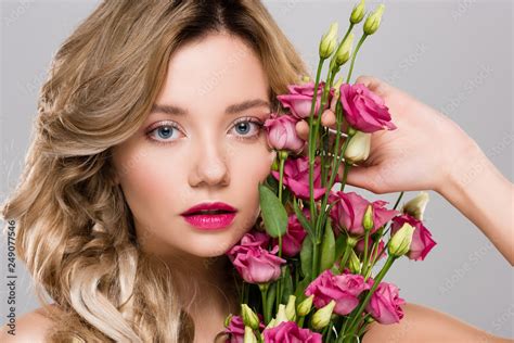 Beautiful Woman Posing With Spring Eustoma Flowers Bouquet Isolated On