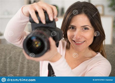 Woman Holding Dslr Camera Stock Image Image Of Focus 267512703