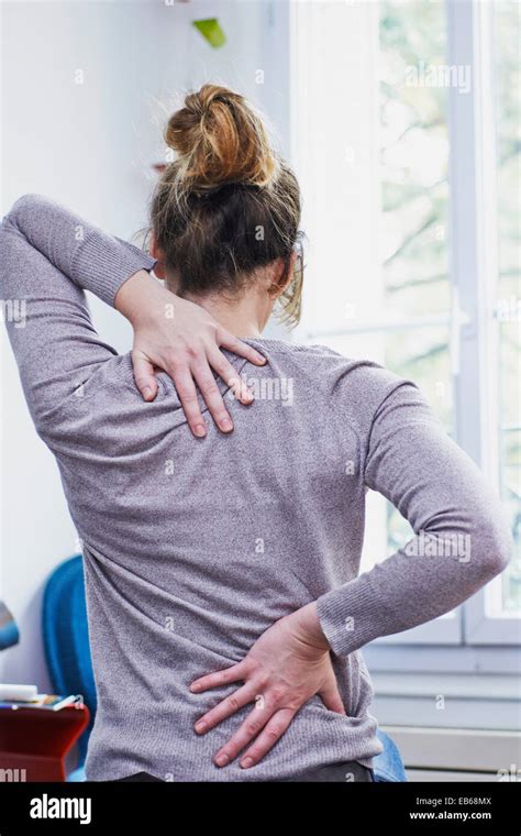 Woman With Back Pain Stock Photo Alamy