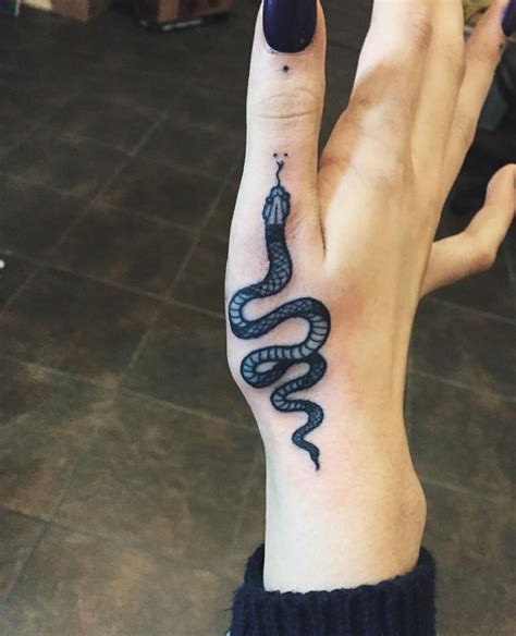 Small Snake Tattoo On Hand Rogers Gardens Hours Today