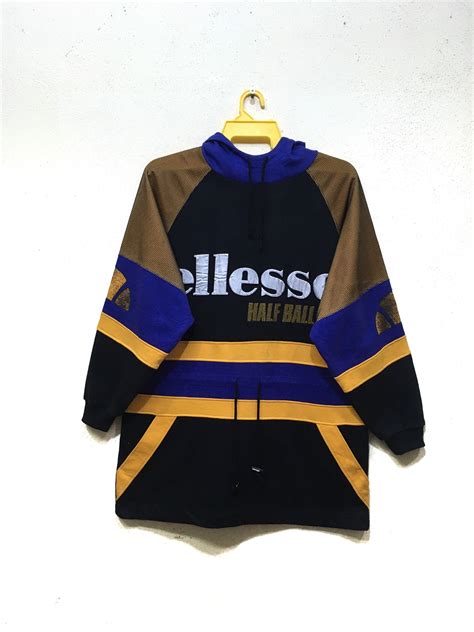 This living area involves the furnishings which are soaked in an ocean of blues; Vintage 90s Ellesse hooded pullover crewneck sweatshirt ...
