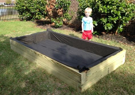 Mark equal distances in four corners for use pieces of 2x4 in each corner to secure the sides to each other. How to build a raised vegetable garden | Rogue Engineer