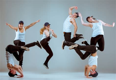 group of men and women dancing hip hop choreography free photo