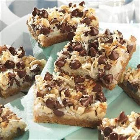 Hello dolly bars, coconut dream bars, seven layer bars, magic cookie bars, coconut magic squares… over the years, these bars have been one of the most a soft graham cracker crust topped with layers of coconut and chocolate makes the bars truly as magical as their title suggests. Eagle Brand Magic Cookie Bars | Just A Pinch Recipes