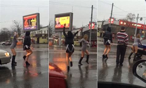 Russian Women In Tiny Miniskirts Twerk On The Bonnets Of Motorists On