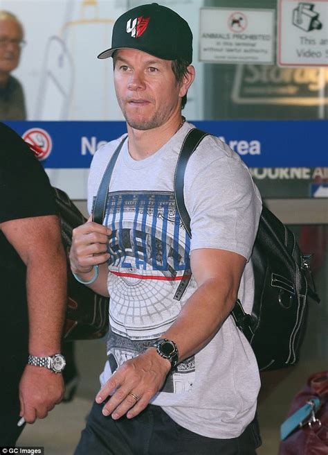 Mark Wahlberg Wears Transformers Cap As He Jets Into Melbourne Ahead Of