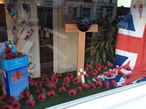 Our window display for Remembrance Week. #brightonfuneraldirector