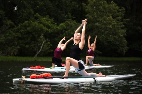 paddle board yoga classes offer unique summer fun shelby county reporter shelby county reporter