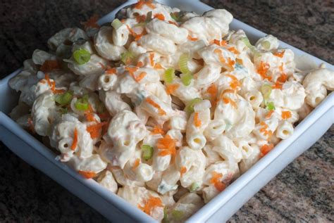Meanwhile, in a large bowl, add mayo, milk, vinegar, with all spices, sugar, and seasoning salt, and whisk until combined. Hawaiian Macaroni Salad Recipe - TGIF - This Grandma is Fun