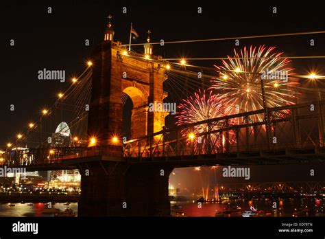 John A Roebling Suspension Bridge With Fireworks In The Background And