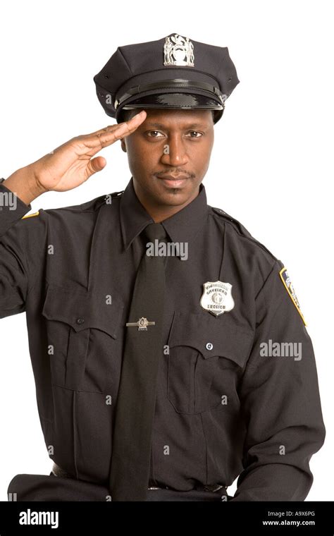 Young Black American Police Officer Saluting The Camera Stock Photo Alamy