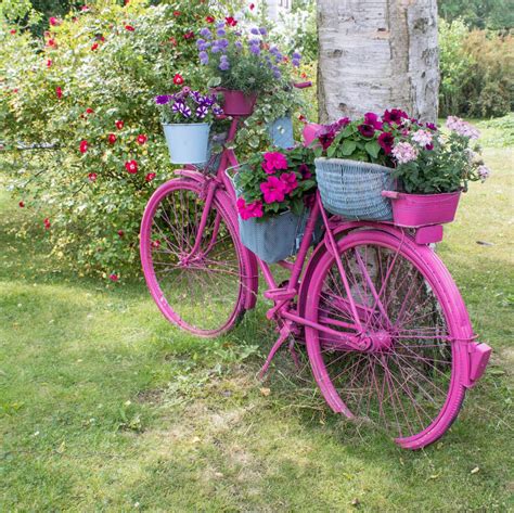 Pink Bicycle Outfitted With Many Flower Holders Garden Yard Ideas Diy