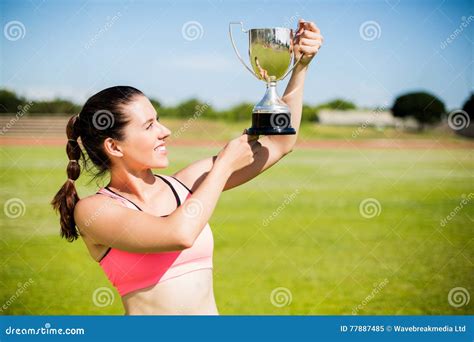 Happy Female Athlete Showing Her Trophy Stock Image Image Of Sunny Holding