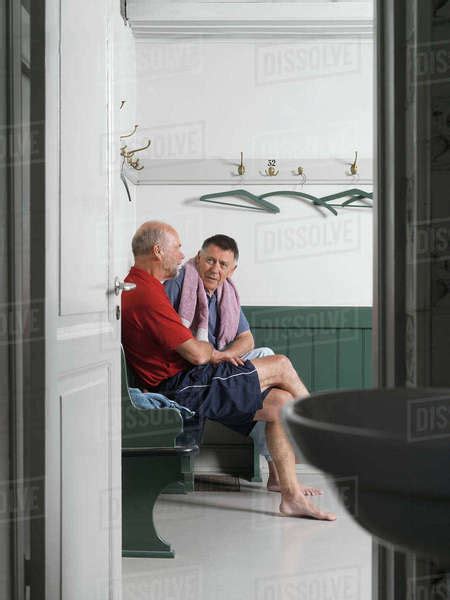 Older Men Sitting In Locker Room Stock Photo Dissolve