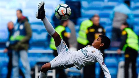 Cristiano ronaldo jr waved his hands in the air at his dad from the sidelines and donned a portugal shirt for the game. Could Cristiano Ronaldo Jr be as good as his dad? - BBC Three