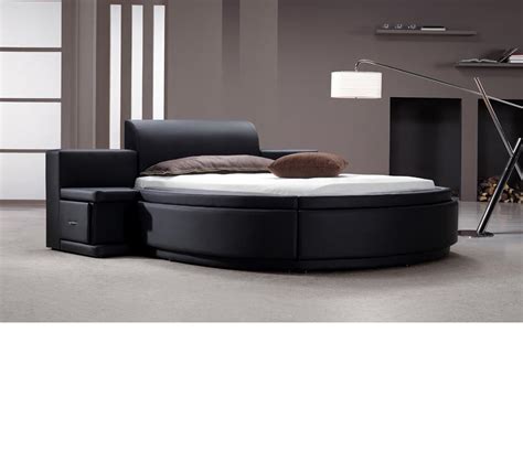With an elegant headboard that features diamond button tufted detailing, this bed radiates a DreamFurniture.com - Owen - Black Leather Round Bed with ...