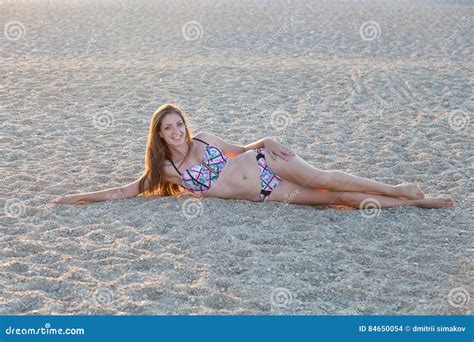 Beautiful Girl Lying On The Beach Ocean Sand Stock Photo Image Of