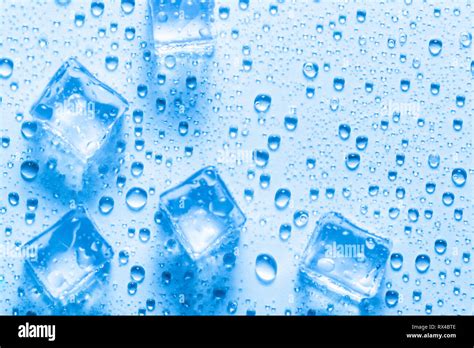 Melted Ice Cubes With Drops Stock Photo Alamy