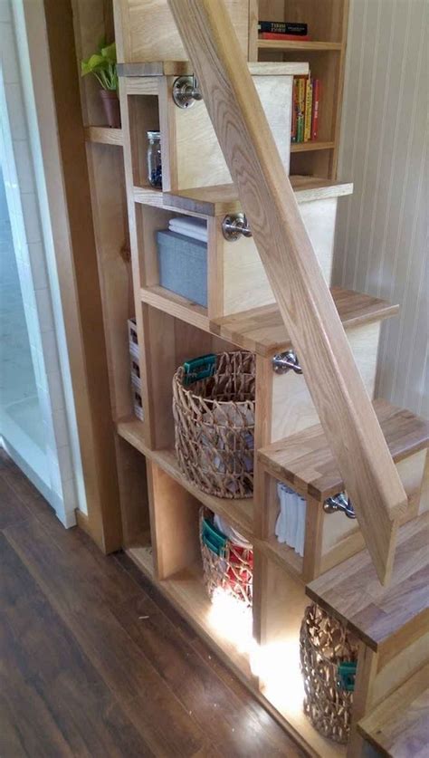 Tiny house stairs that spiral and have storage including a pantry and shelving. 60 Exciting Loft Stair For Tiny House Ideas | Tiny house ...