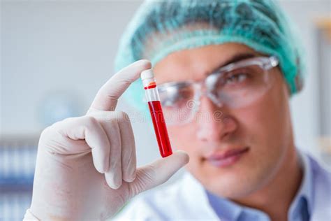 The Young Doctor Working On Blood Test In Lab Hospital Stock Image
