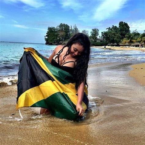jamaica 🇯🇲 l women with flag jamaican people jamaican women jamaican flag flag photoshoot