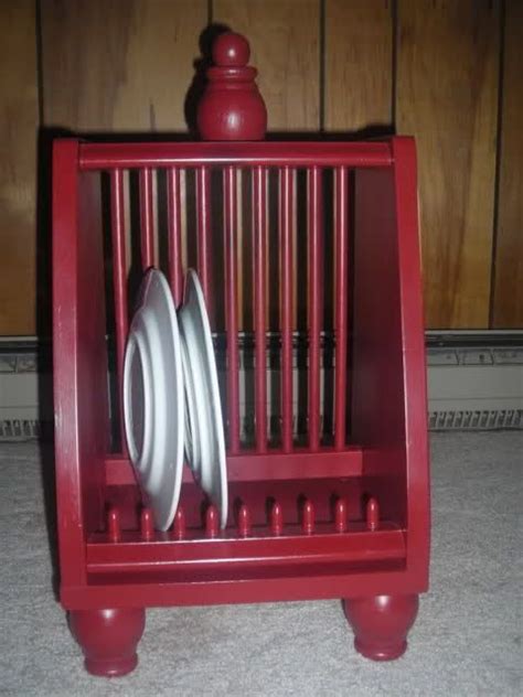 You could buy one at a store, but anything made of real wood seems to cost a fortune these days. adorable plate rack handmade | Plate racks, Kitchen projects, Home decor