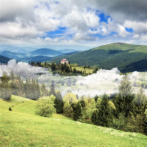 Village On Hillside Meadow With Forest In Mountain Free Photo Download