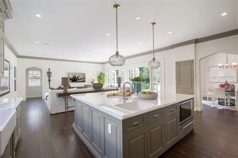 Kitchen island design ideas will decorate your kitchen to have a nice look. Gray kitchen features a pair of gray glass lanterns ...