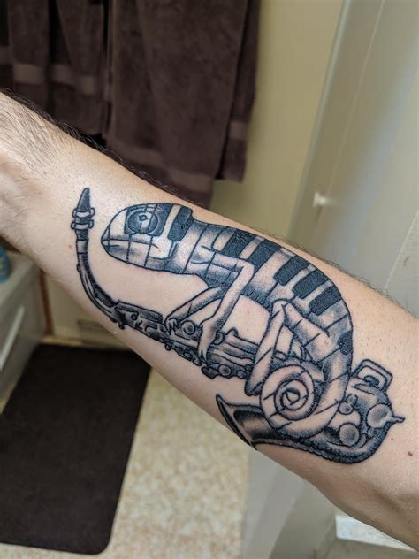 Capitol city tattoo & piercing. Piano-Camo Cameleon on a saxophone from Curtis at Olympia ...