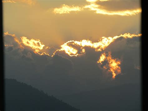 Scenic View Of Mountains Against Sky At Sunset · Free Stock Photo