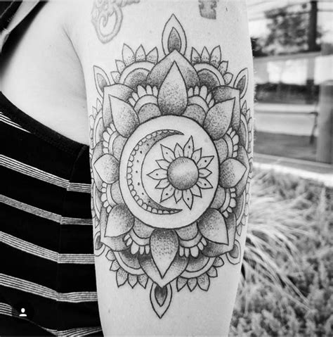 Sun and moon mandala tattoo by Casey Hart at Rose Red Tattoo in
