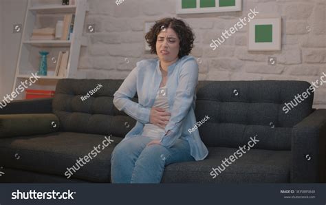 Young Woman Suffering Stomach Abdominal Pain Stock Photo 1835885848