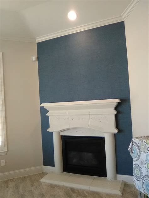 A Beautiful Faux Grasscloth Sets Off A Fireplace Wall