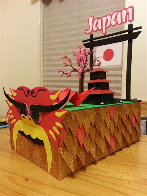 This Is An Image Of A Japanese Themed Table Top With Paper Cutouts On It