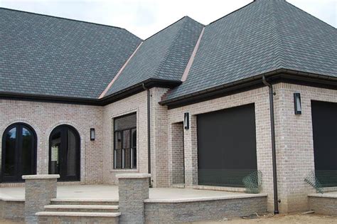Downspouts should match the body of the house except when they fall on the trim. Prime Gutters
