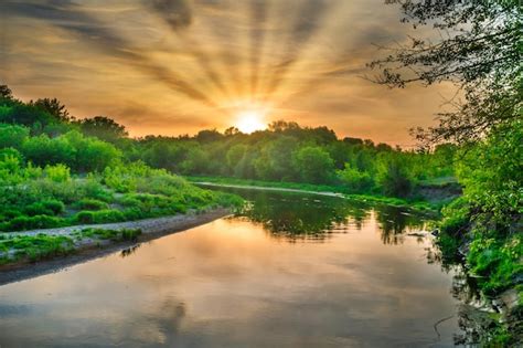 Premium Photo Sunset Over River Landscape With Sun Rays Green Trees