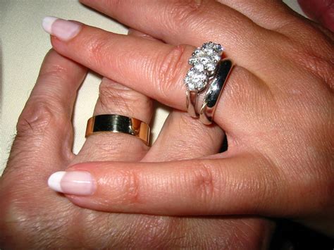 It is not common for men to wear or even have engagement rings, but this is what we usually call men's wedding rings but you can also say a woman is wearing a wedding band if her ring does not have a diamond on it. Wearing Wedding Band | Wearing Wedding Band On Right Hand ...
