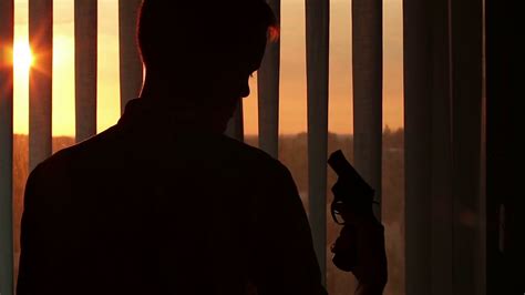 A Man Puts Gun To Head Suicide Is Preparing Stock Footage Sbv 324457097