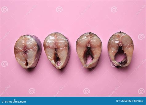 Slices Of Fish On Color Background Erotic Concept Stock Photo Image