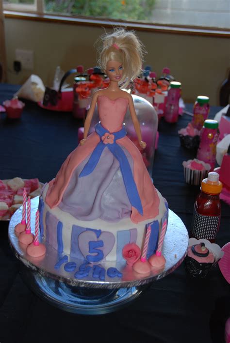 The barbie cake recipe looks difficult to make. pink and purple barbie cake (as requested by the 5 year ...