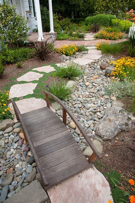 Put a rock border around your garden and make it pop! 15 Stylish Garden Designs That Use Stones And Rocks