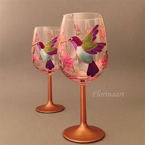 Beautiful Set Of 2 Wine Glasses Decorated With A Hummingbird In Between Pink Flowers They Would