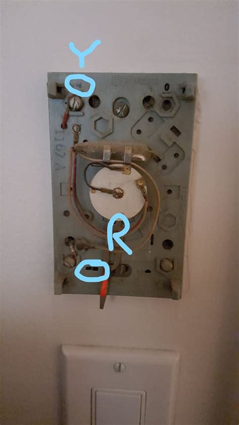 Do not disconnect wires from the old thermostat until you label all the wires according to this manual. wiring - Old Thermostat with just R and Y wires? - Home Improvement Stack Exchange