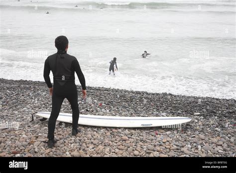 Lima Peru Surfing Beach Below The Cliffs Of Miraflores Stock Photo Alamy