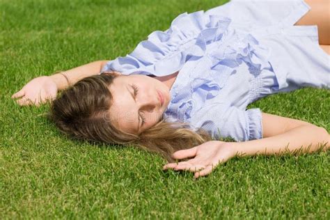 Beautiful Girl Lying Down Of Grass Stock Photo Image Of Happiness