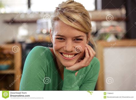 woman smiling at camera sitting and smiling stock image image of fashionable food 77689421