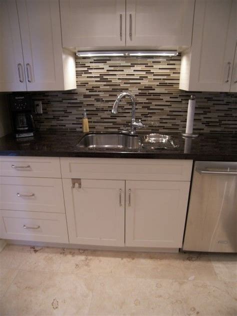 Walmart.com has been visited by 1m+ users in the past month White cabinets, black countertop, backsplash brings beige ...
