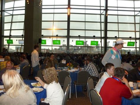 Community health assistance scheme (chas). East Club Level windows capture downtown Denver during dinner.