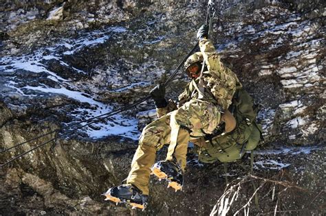 A Soldier Rappels Down The Face Of A Cliff On Smugglers Notch In